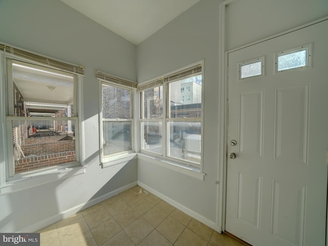 unfurnished sunroom featuring a wealth of natural light