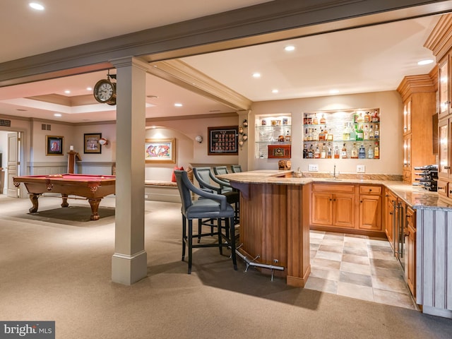 bar with light stone counters, light colored carpet, and billiards