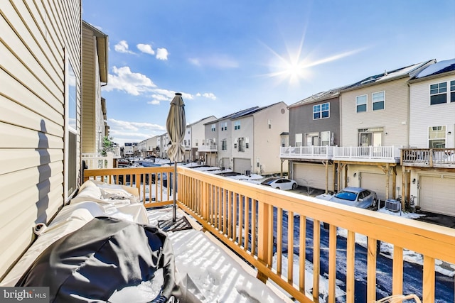 view of snow covered deck