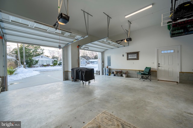 garage featuring a garage door opener