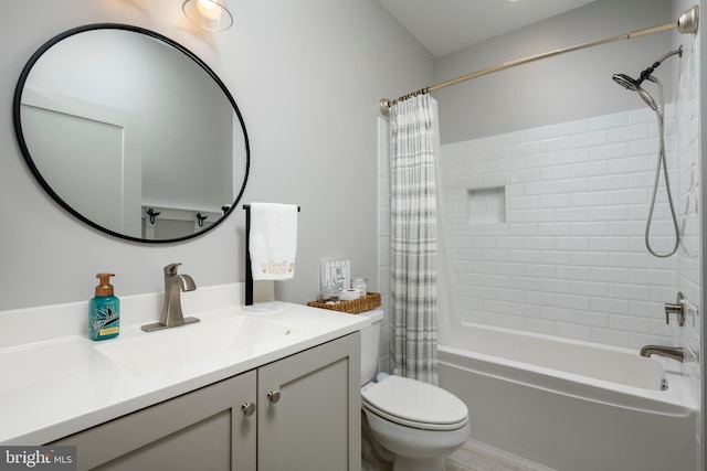 full bathroom featuring vanity, toilet, and shower / bath combo