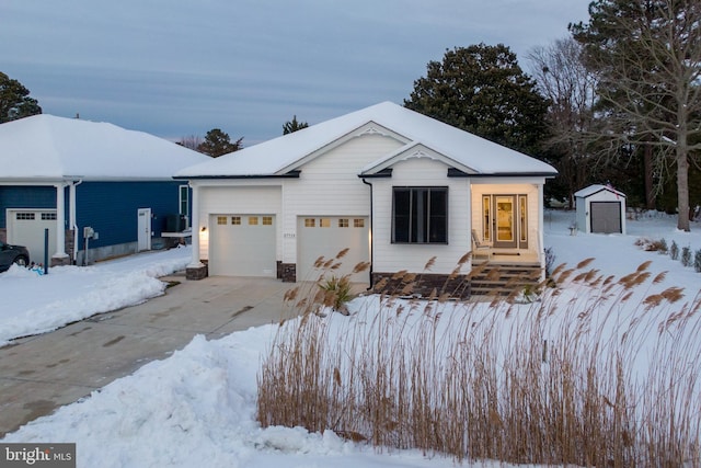 view of front facade with a shed