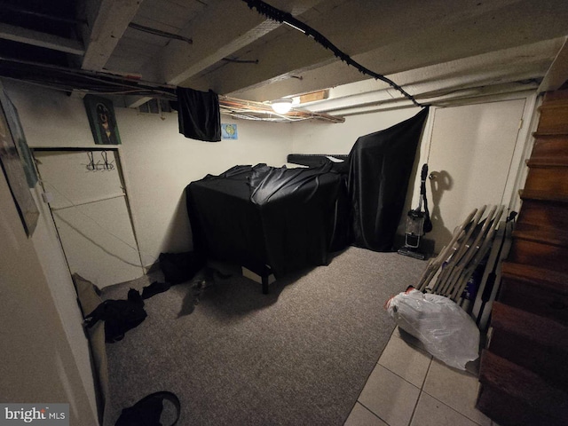 basement featuring tile patterned floors