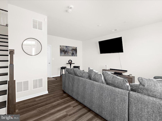 living room with dark wood-type flooring