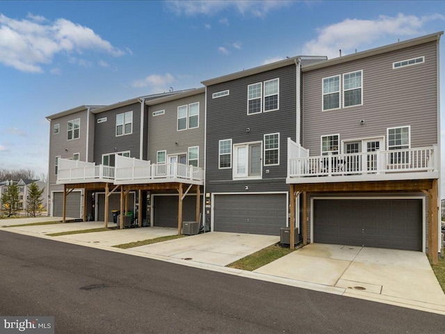 rear view of property with central air condition unit