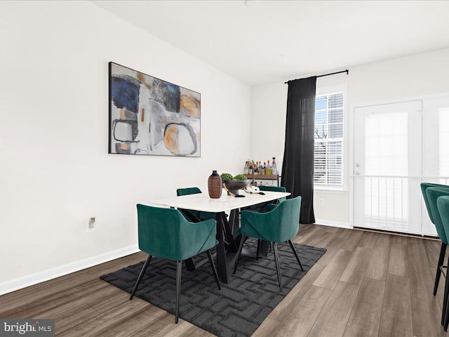 dining area featuring hardwood / wood-style flooring