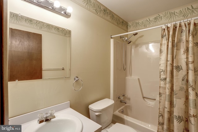 full bathroom featuring vanity, toilet, and shower / tub combo with curtain