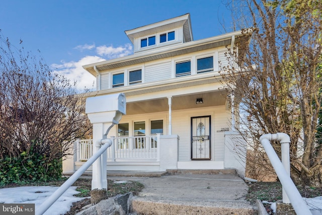 view of front of home featuring covered porch