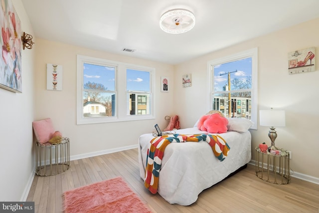 bedroom featuring light hardwood / wood-style floors