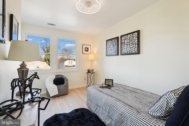 bedroom with light hardwood / wood-style flooring