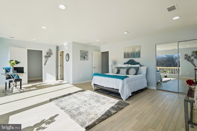 bedroom with light wood-type flooring