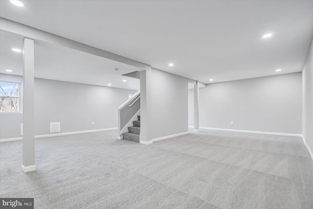 basement with light colored carpet