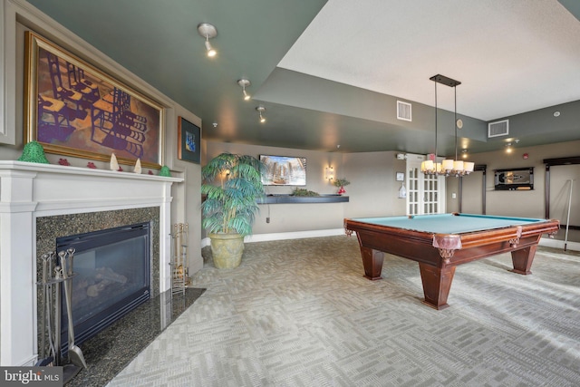 playroom with carpet flooring, a fireplace, pool table, and french doors