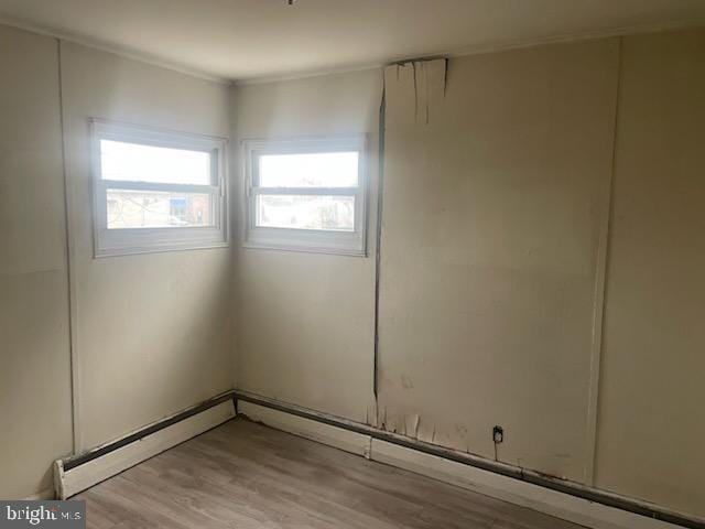 unfurnished room featuring light wood-type flooring