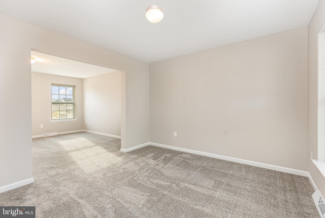 view of carpeted spare room