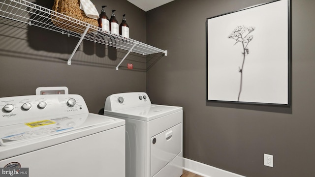 washroom with washer and dryer