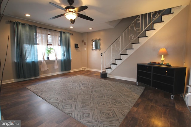 foyer entrance featuring ceiling fan and dark hardwood / wood-style flooring