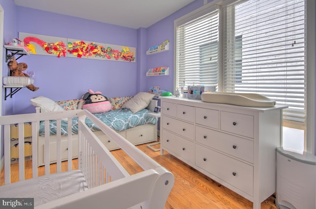 bedroom featuring light wood-type flooring