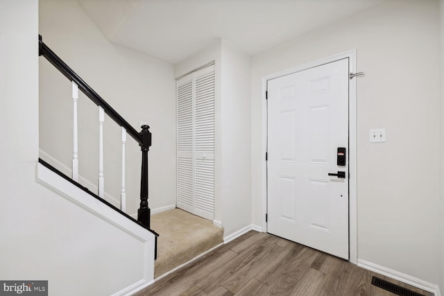 foyer with hardwood / wood-style floors