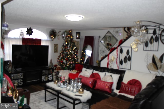 living room featuring an inviting chandelier