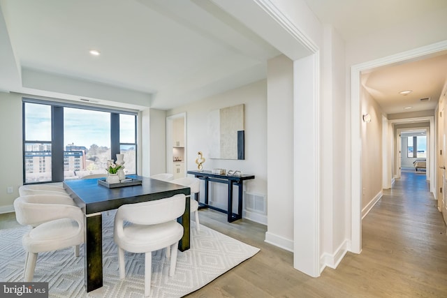 dining room featuring light hardwood / wood-style floors