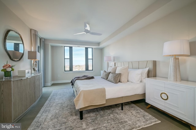 bedroom featuring dark wood-type flooring and ceiling fan