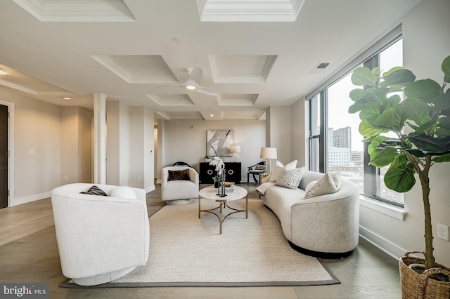 living room with ceiling fan, coffered ceiling, decorative columns, and hardwood / wood-style floors