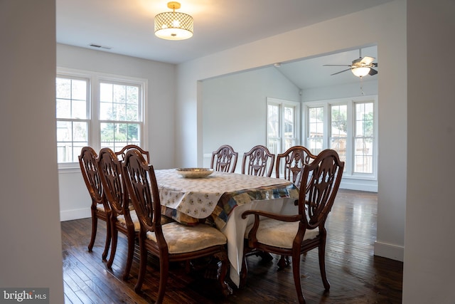 dining area featuring ceiling fan, dark hardwood / wood-style floors, and lofted ceiling