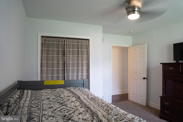 carpeted bedroom featuring ceiling fan