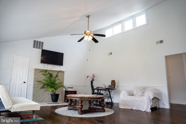 sitting room featuring ceiling fan, dark wood-type flooring, and high vaulted ceiling