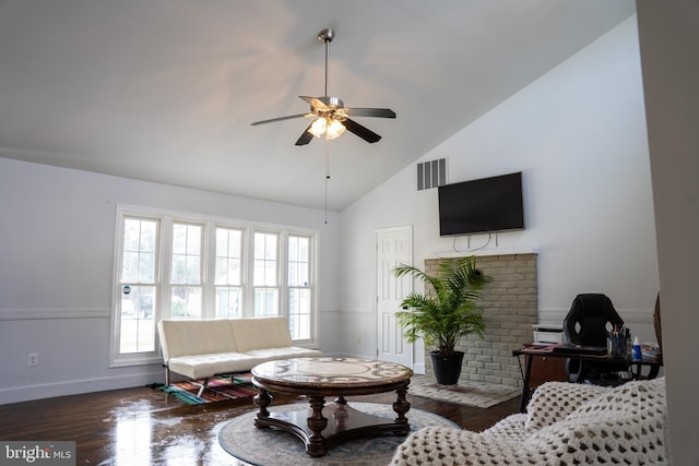 living room with dark wood-type flooring, high vaulted ceiling, and ceiling fan