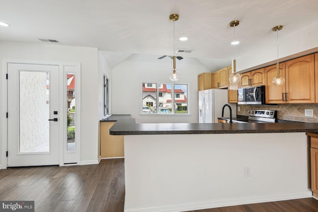 kitchen with electric range, white fridge with ice dispenser, a healthy amount of sunlight, backsplash, and pendant lighting