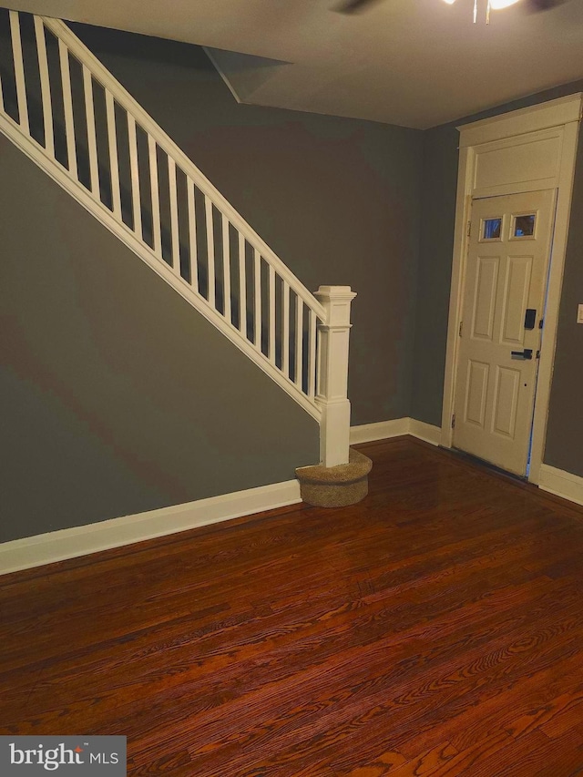 entrance foyer featuring dark wood-type flooring