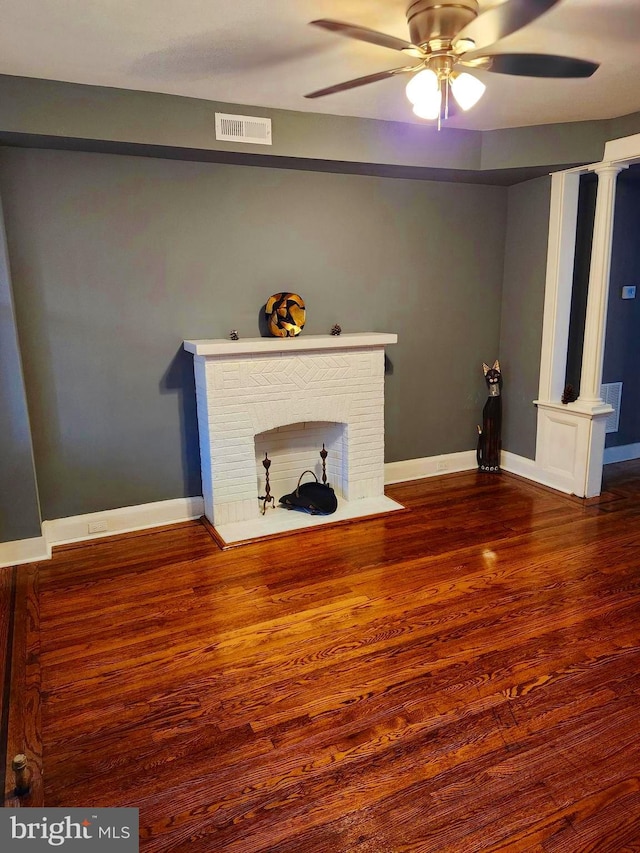 unfurnished living room with ceiling fan and hardwood / wood-style flooring