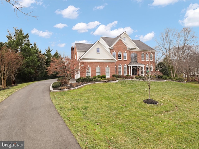 view of front facade with a front lawn