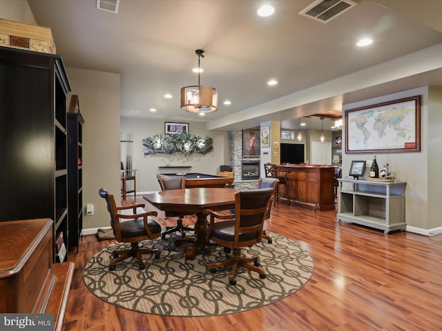 dining area featuring wood-type flooring