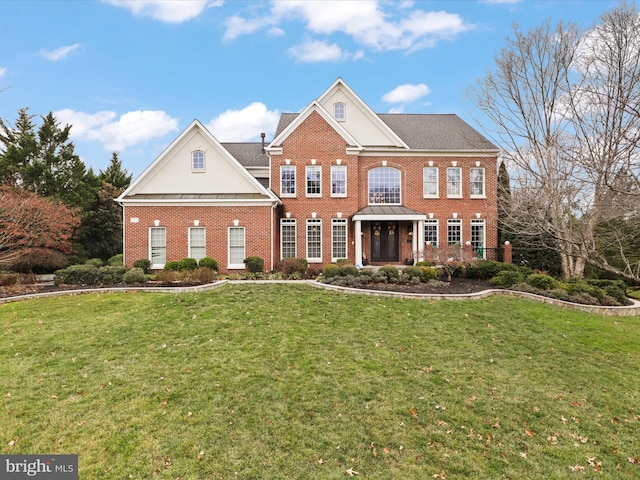 view of front facade with a front lawn