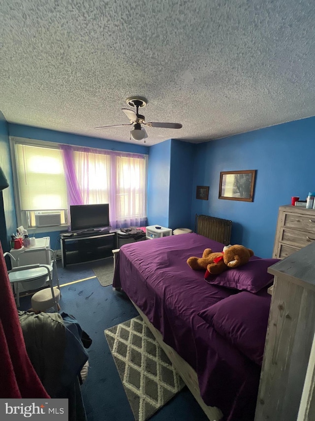 carpeted bedroom featuring a textured ceiling, ceiling fan, and cooling unit