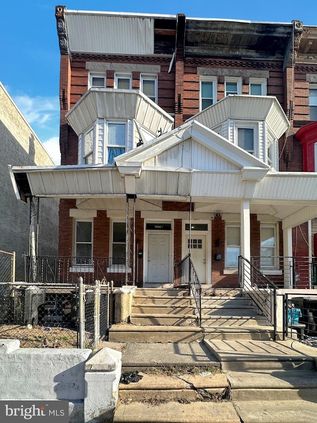 view of property with covered porch