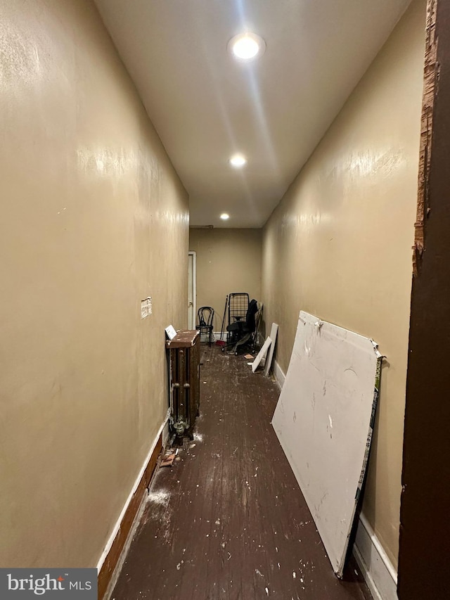 hallway featuring dark hardwood / wood-style floors