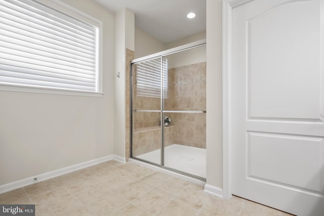 bathroom with an enclosed shower