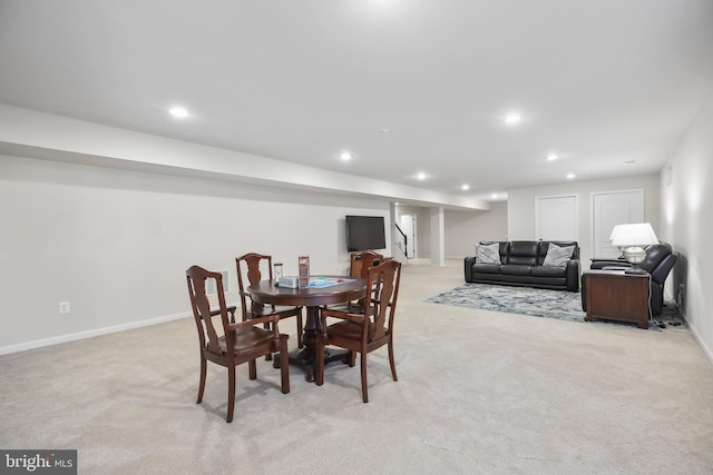 dining area with light carpet