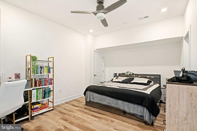 bedroom featuring hardwood / wood-style floors and ceiling fan