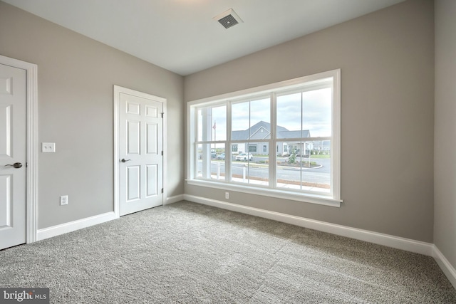 unfurnished bedroom with carpet floors