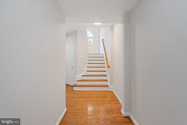 hallway with light wood-type flooring