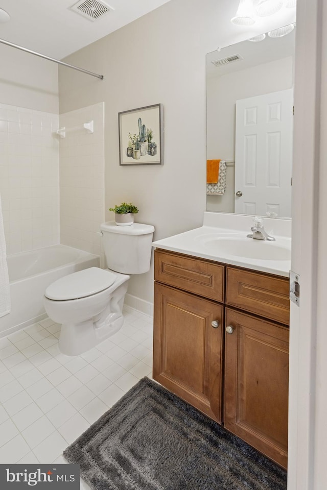 full bathroom with tile patterned floors, vanity, toilet, and shower / washtub combination