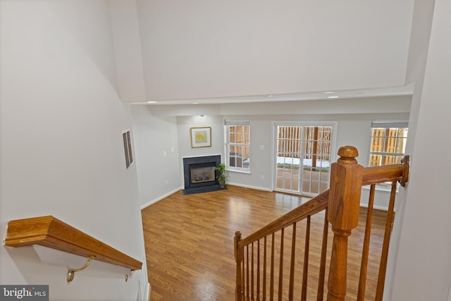 stairs with wood-type flooring