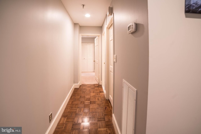 hall featuring dark parquet floors