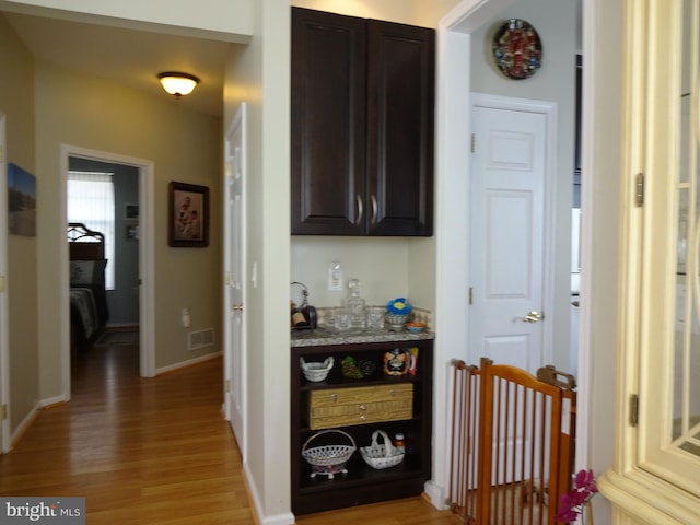 hall featuring light hardwood / wood-style floors