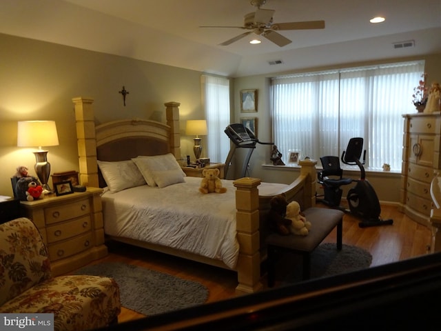 bedroom featuring hardwood / wood-style floors and ceiling fan